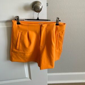Target. Size 2. Orange pleated shorts
